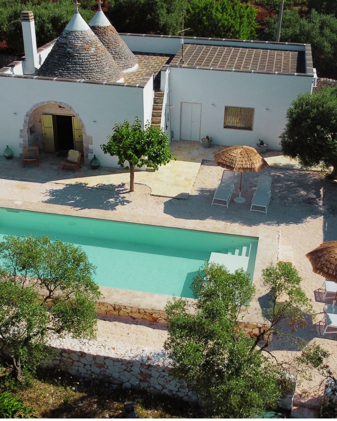 Aerial view of the trullo and private pool from above